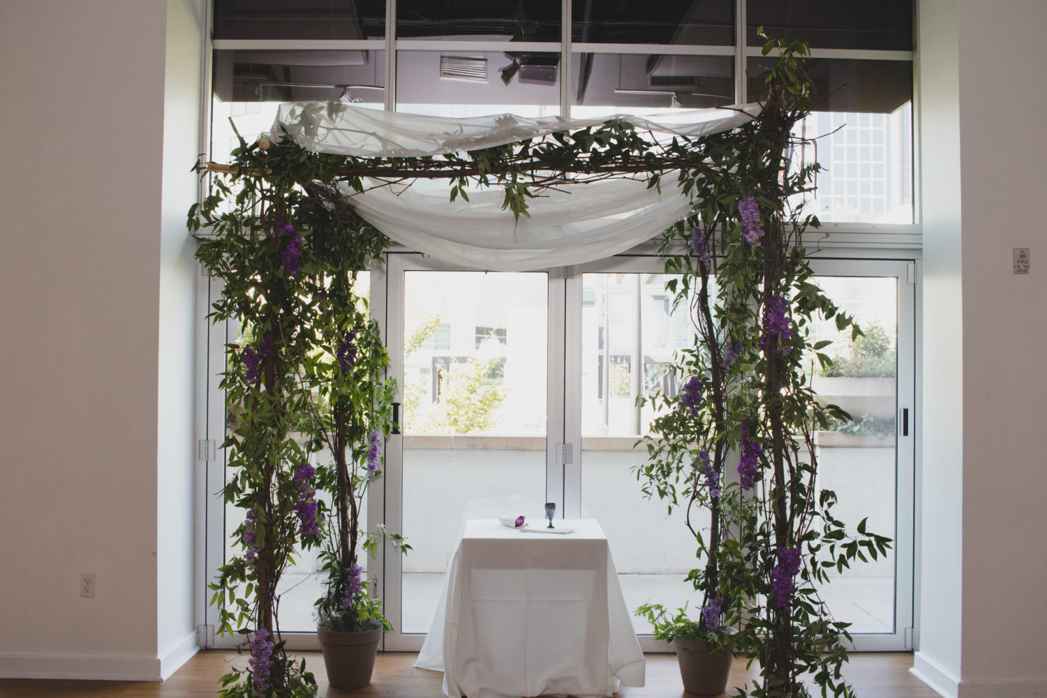 Custom purple and green chuppah