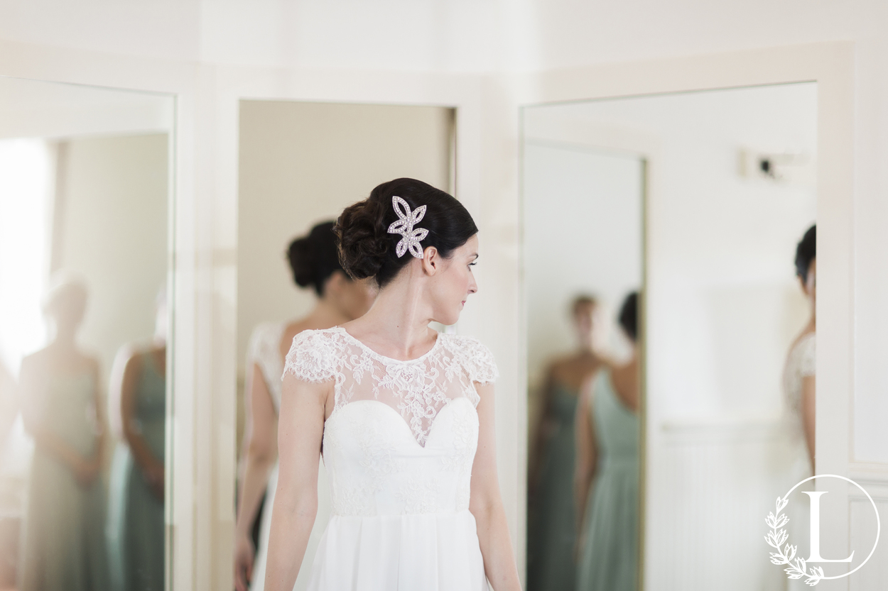 lace wedding gown with open back and cap sleeve